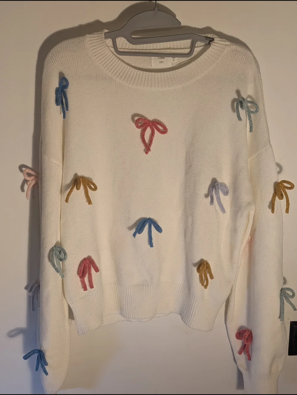 Ivory Crewneck Sweater with Multicolor Bow Appliqués - Picture 1 of 4